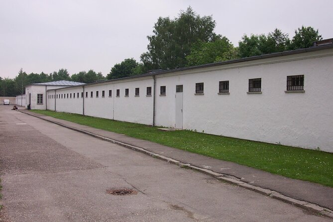 Dachau Concentration Camp Memorial Tour with Train from Munich - Stop at Dachau Memorial: How the Guide Moves You Through the Site