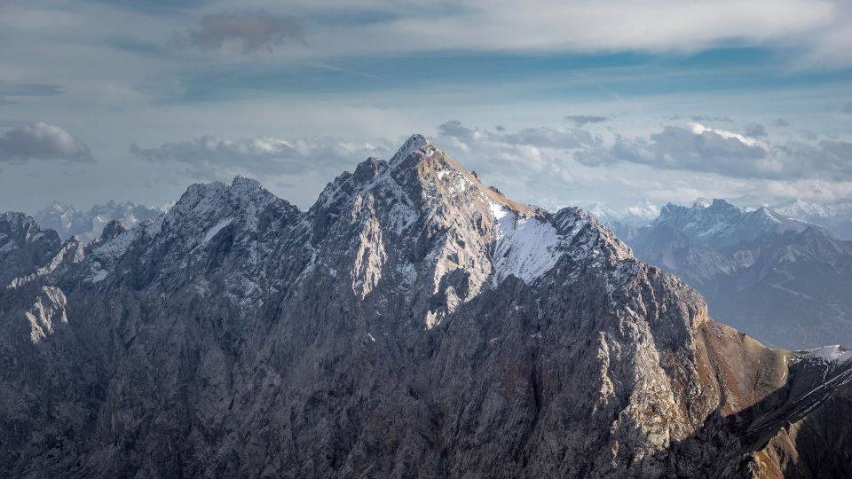 From Munich: Zugspitze Mountain Van Tour with Garmisch Town - Garmisch-Partenkirchen: The Alpine Town Stop That Grounds the Day