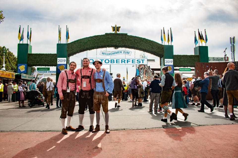 Munich: Oktoberfest Tour with Tent Reservation, Food & Beer - Inside the tent: reserved table energy, 2 liters of beer, and a typical meal